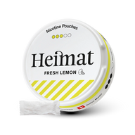 Heimat Fresh Lemon Nicotine Pouches Dose mit weißem Design, gelben Streifen und einzelnem weißem Beutel, mittlere